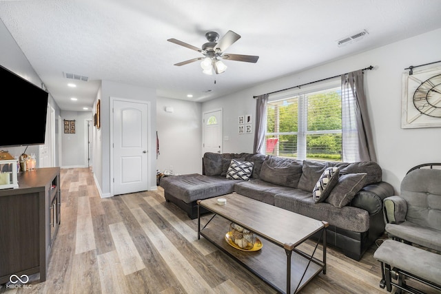 508 Jefferson, Coatesville, IN 46121 - living area featuring a ceiling fan, light wood-style floors, and recessed lighting