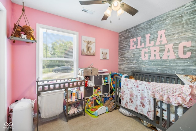 508 Jefferson, Coatesville, IN 46121 - carpeted bedroom with an accent wall and a ceiling fan