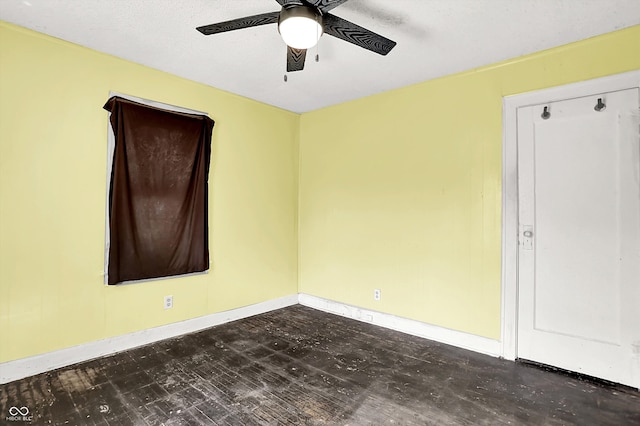 1523 E Mills Ave, Indianapolis, IN 46227 - spare room featuring a ceiling fan and baseboards