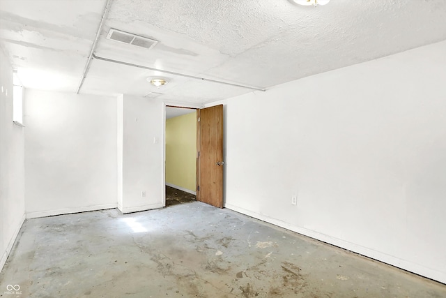1523 E Mills Ave, Indianapolis, IN 46227 - spare room featuring unfinished concrete flooring