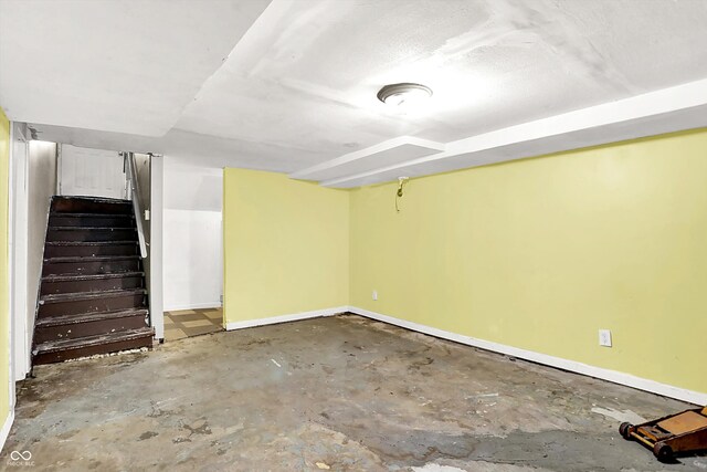 1523 E Mills Ave, Indianapolis, IN 46227 - below grade area featuring baseboards and stairs