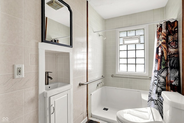 1523 E Mills Ave, Indianapolis, IN 46227 - bathroom with tile walls, toilet, a shower with shower curtain, and vanity