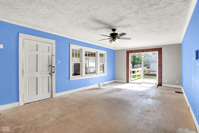 1523 E Mills Ave, Indianapolis, IN 46227 - foyer entrance with ornamental molding, ceiling fan, baseboards, and a textured ceiling