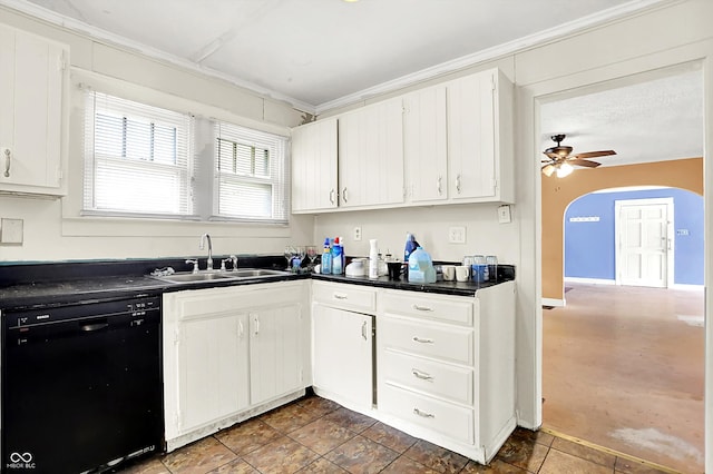 1523 E Mills Ave, Indianapolis, IN 46227 - kitchen with dishwasher, a sink, dark countertops, ceiling fan, and arched walkways
