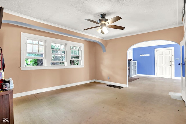 1523 E Mills Ave, Indianapolis, IN 46227 - spare room with arched walkways, baseboards, a textured ceiling, a ceiling fan, and ornamental molding