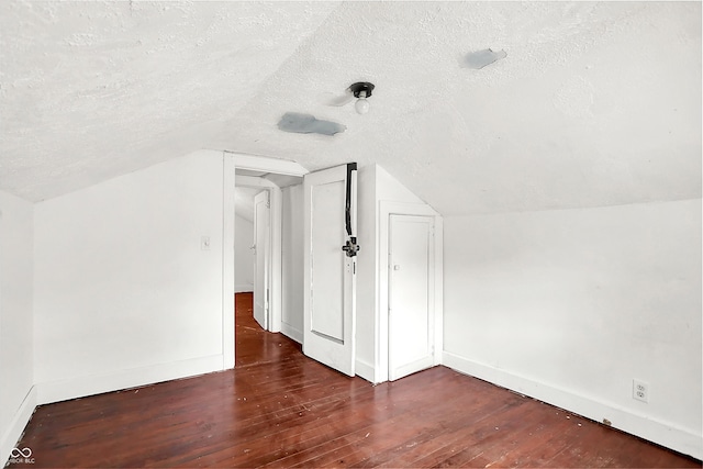 1523 E Mills Ave, Indianapolis, IN 46227 - bonus room featuring a textured ceiling, hardwood / wood-style floors, and lofted ceiling