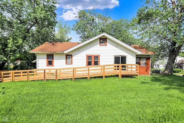 1523 E Mills Ave, Indianapolis, IN 46227 - back of property with a shingled roof and a wooden deck