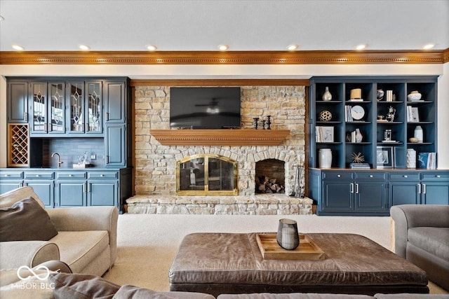 11715 Landings Dr, Indianapolis, IN 46256 - living room with wet bar, a stone fireplace, and recessed lighting
