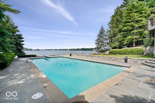 11715 Landings Dr, Indianapolis, IN 46256 - swimming pool featuring a water view, a patio, and a diving board