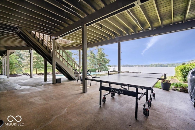 11715 Landings Dr, Indianapolis, IN 46256 - view of patio / terrace with stairway and a water view