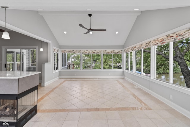 11226 Blackwalnut Pt, Indianapolis, IN 46236 - unfurnished sunroom with baseboards, high vaulted ceiling, recessed lighting, inlaid floor details, and tile patterned floors