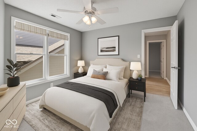 11226 Blackwalnut Pt, Indianapolis, IN 46236 - bedroom featuring baseboards, ceiling fan, and light colored carpet