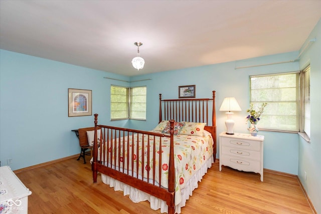 7401 Spring Mill Rd, Indianapolis, IN 46260 - bedroom featuring wood finished floors and baseboards