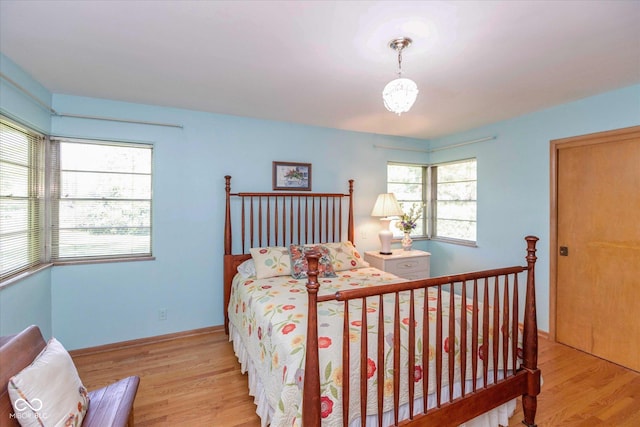 7401 Spring Mill Rd, Indianapolis, IN 46260 - bedroom featuring wood finished floors and baseboards