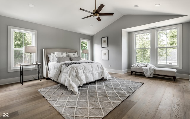 5682 Broadway St, Indianapolis, IN 46220 - bedroom with vaulted ceiling, wood finished floors, baseboards, ceiling fan, and recessed lighting