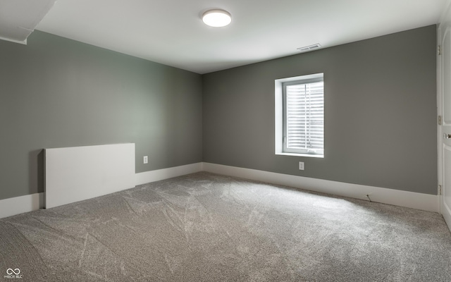 5682 Broadway St, Indianapolis, IN 46220 - empty room featuring carpet flooring and baseboards