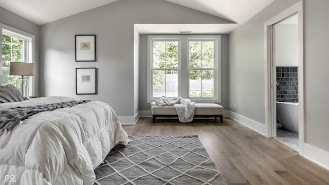 5682 Broadway St, Indianapolis, IN 46220 - bedroom featuring wood finished floors, lofted ceiling, and baseboards
