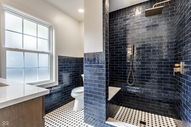5682 Broadway St, Indianapolis, IN 46220 - full bath with tile walls, toilet, wainscoting, walk in shower, and recessed lighting
