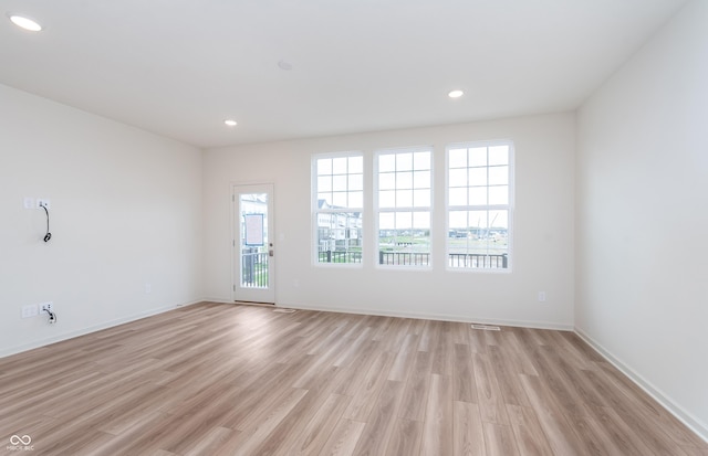 14515 Hanford Ln, Carmel, IN 46074 - unfurnished room featuring light wood finished floors, recessed lighting, and baseboards