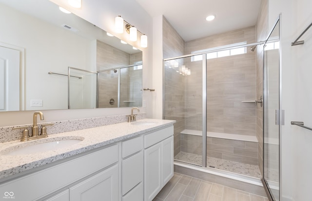 14515 Hanford Ln, Carmel, IN 46074 - bathroom featuring a stall shower, double vanity, and recessed lighting