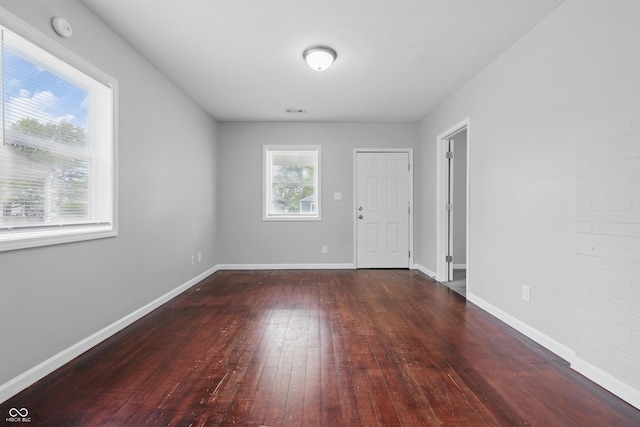2030 Houston St, Indianapolis, IN 46218 - foyer entrance featuring wood-type flooring and baseboards