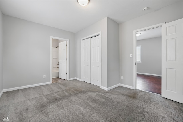 2030 Houston St, Indianapolis, IN 46218 - unfurnished bedroom with carpet floors, baseboards, a closet, and ensuite bath