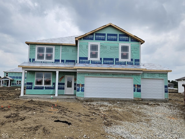 6031 Madera Dr, Whitestown, IN 46075 - unfinished property featuring covered porch and an attached garage