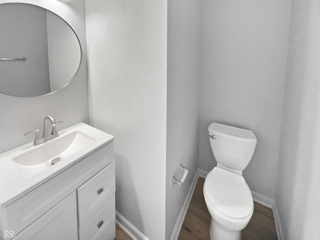 10366 Camby Xing, Fishers, IN 46038 - half bath featuring toilet, vanity, and baseboards