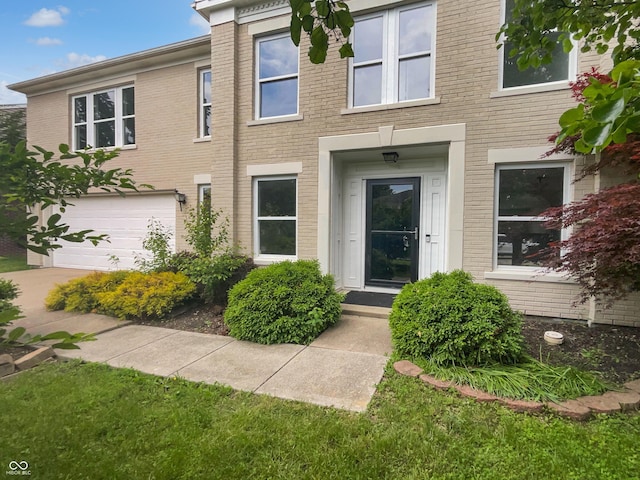 10366 Camby Xing, Fishers, IN 46038 - view of front of home with brick siding and a garage