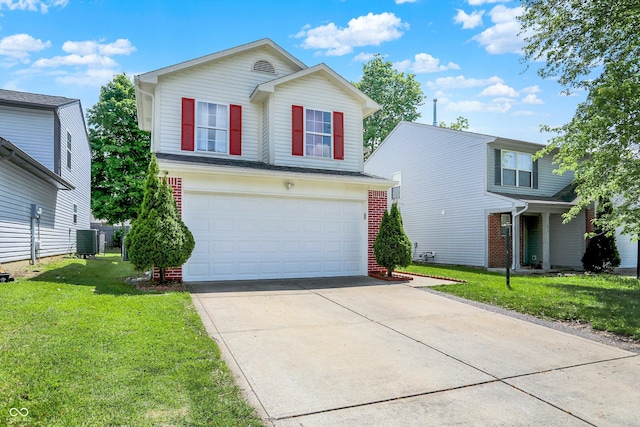 traditional-style house featuring brick siding, an attached garage, central air condition unit, a front lawn, and driveway