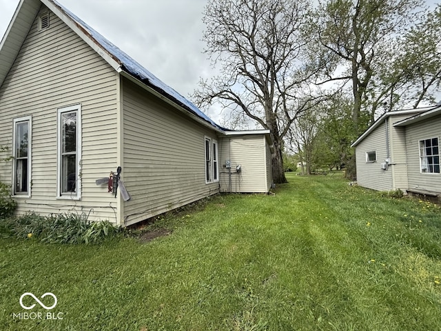 105 N Sheridan St, Ridgeville, IN 47380 - view of home's exterior with a yard