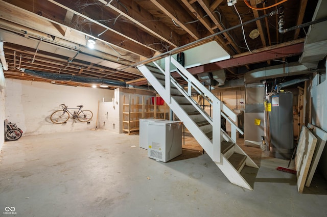 7910 N College Ave, Indianapolis, IN 46240 - unfinished basement featuring stairs and refrigerator