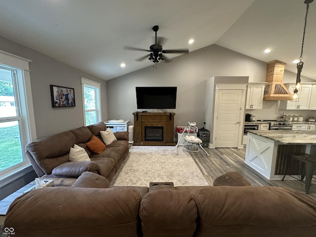 29 Victory, Coatesville, IN 46121 - living room with vaulted ceiling, ceiling fan, dark wood-style flooring, plenty of natural light, and recessed lighting