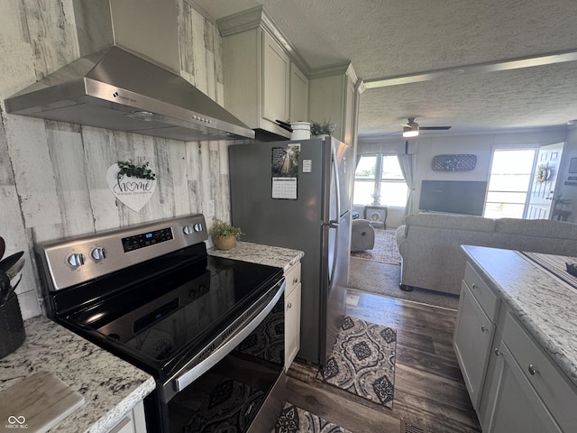 216 E Wabash St, Wingate, IN 47994 - kitchen with stainless steel appliances, wall chimney exhaust hood, a textured ceiling, dark wood-style flooring, and ceiling fan