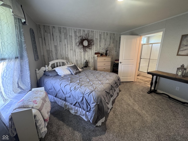 216 E Wabash St, Wingate, IN 47994 - bedroom with carpet flooring, ornamental molding, and wooden walls