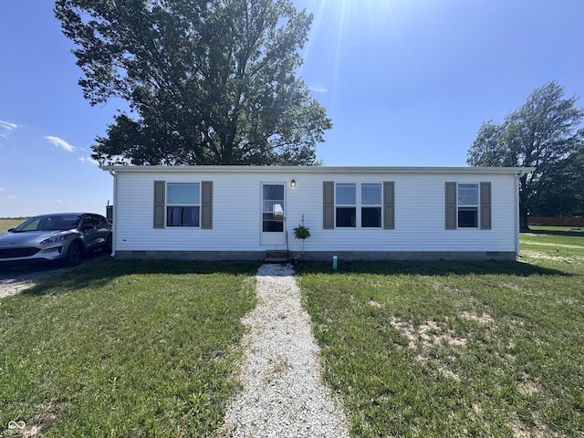 216 E Wabash St, Wingate, IN 47994 - manufactured / mobile home featuring crawl space and a front lawn