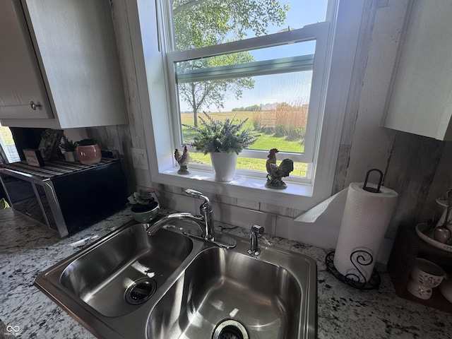 216 E Wabash St, Wingate, IN 47994 - kitchen view of a sink and stainless steel microwave