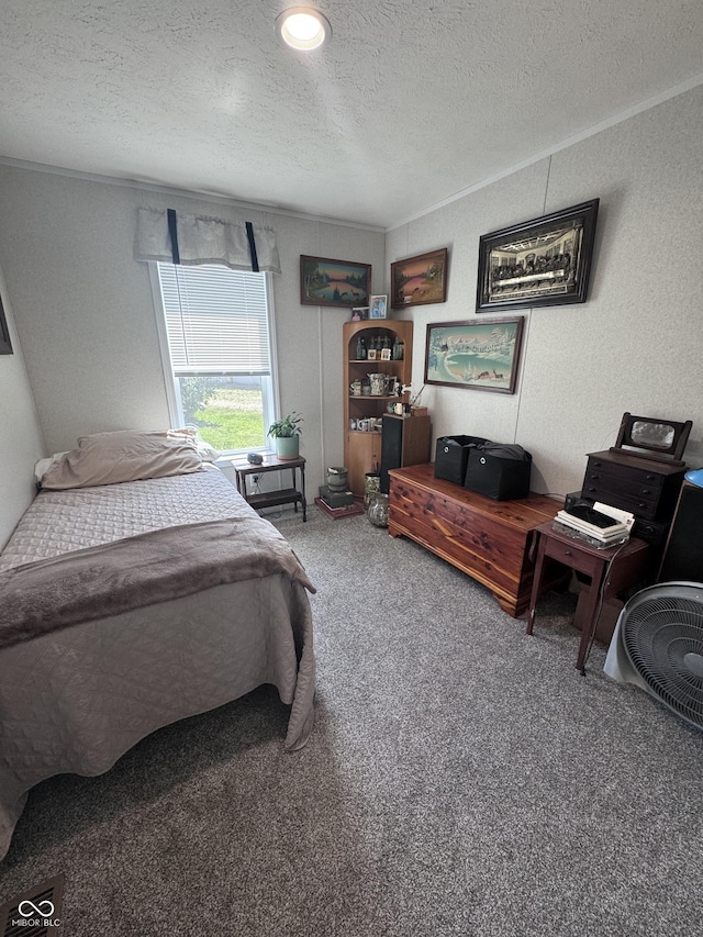 216 E Wabash St, Wingate, IN 47994 - bedroom with a textured ceiling, carpet, and ornamental molding