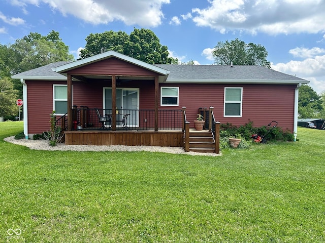 346 W N St, Gosport, IN 47433 - back of house featuring a lawn and roof with shingles