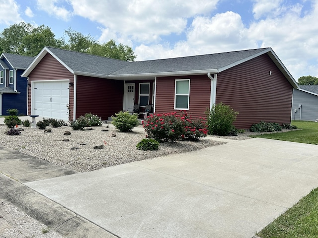 346 W N St, Gosport, IN 47433 - single story home featuring covered porch, a garage, and roof with shingles