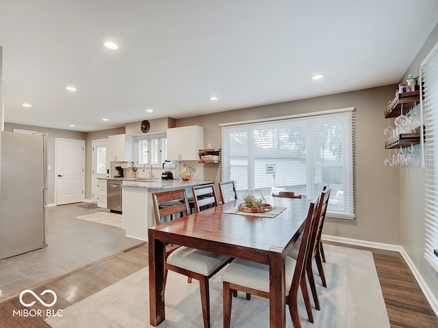 3659 Watson Rd, Indianapolis, IN 46205 - dining room featuring light wood-type flooring, baseboards, and recessed lighting