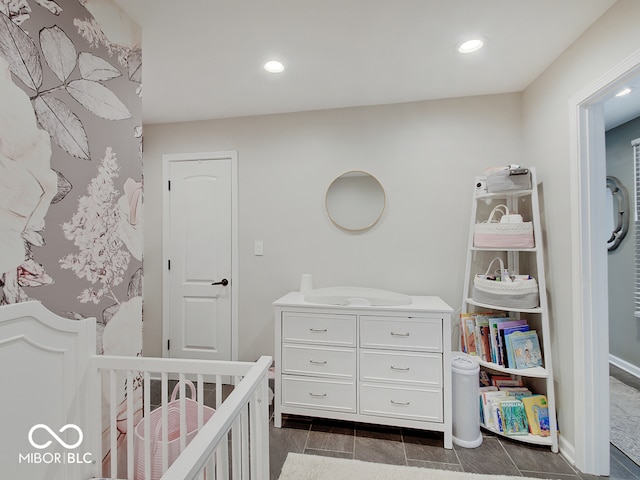 3659 Watson Rd, Indianapolis, IN 46205 - bedroom with a nursery area, recessed lighting, and baseboards
