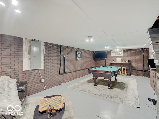 3659 Watson Rd, Indianapolis, IN 46205 - recreation room featuring brick wall, billiards, electric panel, and finished concrete flooring