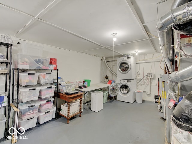 3659 Watson Rd, Indianapolis, IN 46205 - basement featuring stacked washing machine and dryer and water heater