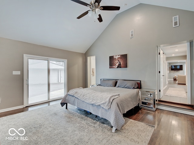 3659 Watson Rd, Indianapolis, IN 46205 - bedroom with dark wood-style flooring, high vaulted ceiling, access to outside, a ceiling fan, and connected bathroom