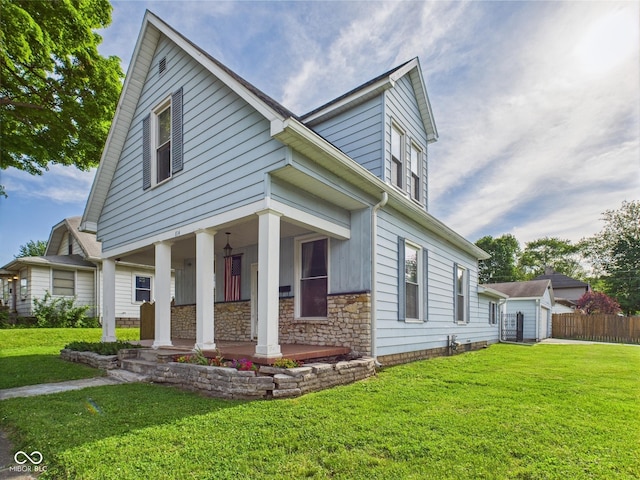 814 Walnut St, Anderson, IN 46012 - view of front facade with stone siding and a porch