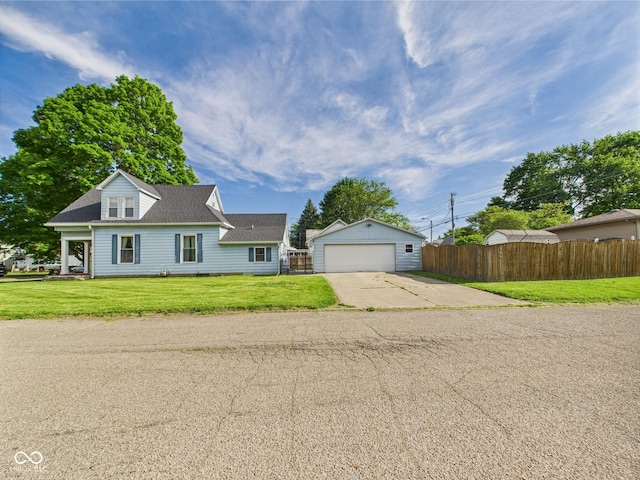 814 Walnut St, Anderson, IN 46012 - view of front facade with an outbuilding, a garage, and roof with shingles