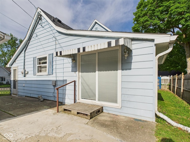 814 Walnut St, Anderson, IN 46012 - rear view of property featuring a patio