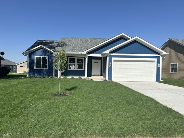 223 N Coventry Dr, Anderson, IN 46012 - ranch-style home with a garage, concrete driveway, a front yard, and roof with shingles