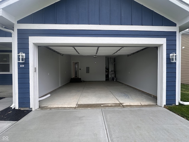 223 N Coventry Dr, Anderson, IN 46012 - garage with concrete driveway